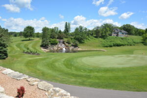 White Eagle Golf Course and the well-known waterfall directly behind the clubhouse.. www.durhamexecutivegroup.com